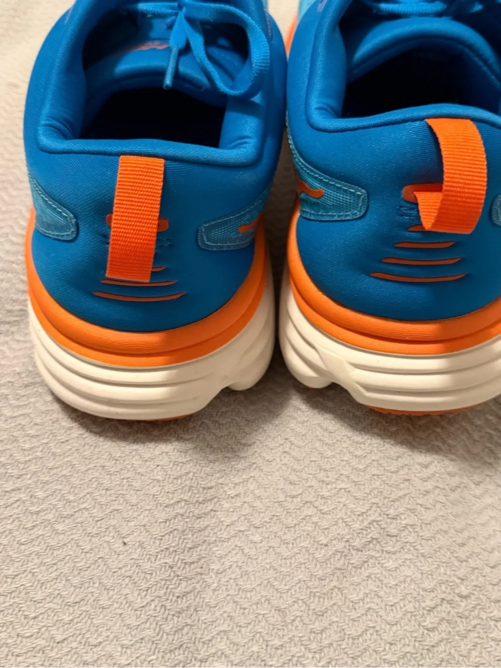 Hoka Men's Blue and Orange Cushioned Running Sneakers size 10